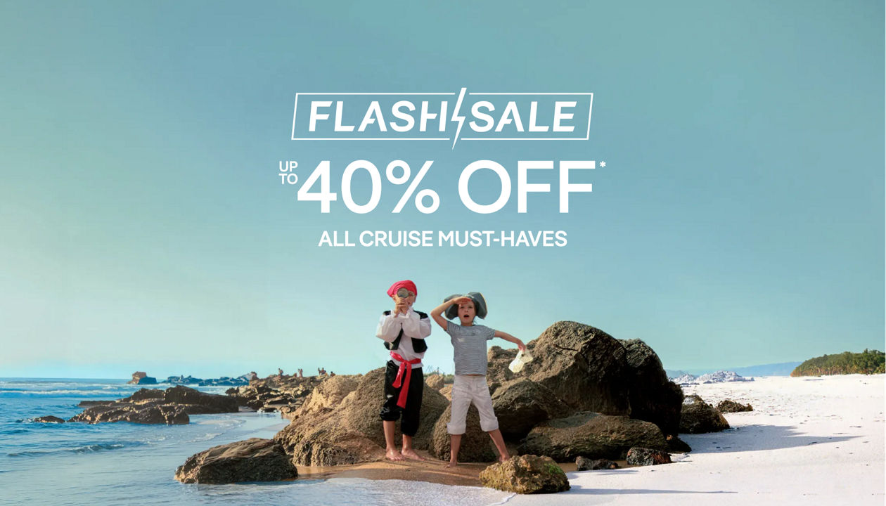 Two children in costumes enjoy a beach with a sea view and a special offer | MSC Cruises