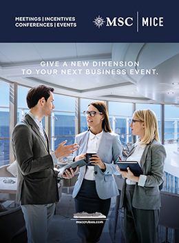 Group of professionals sharing ideas in an office setting with smiles | MSC Cruises