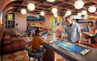 Cozy club interior with people interacting and playing games | MSC Cruises