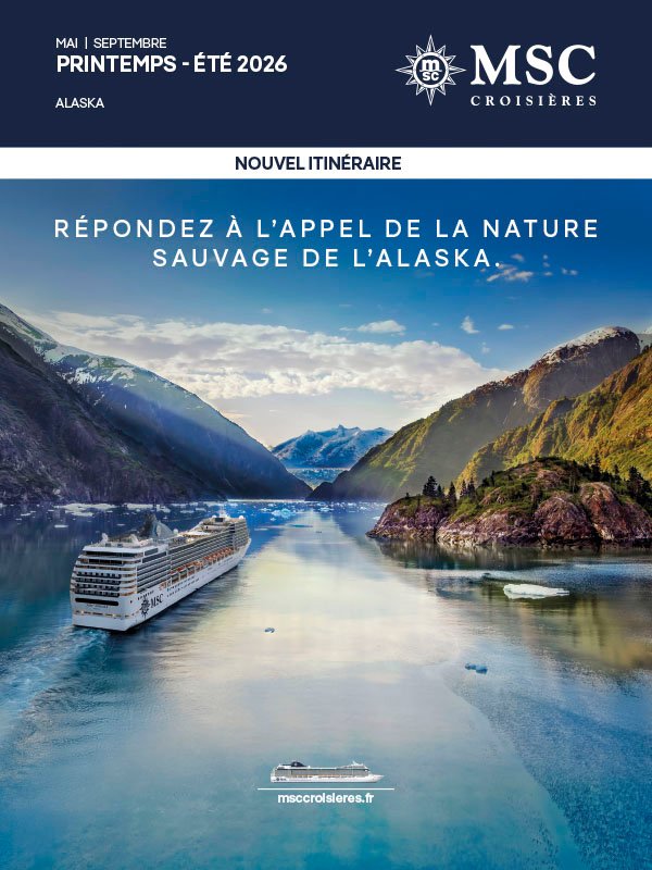 Un navire naviguant dans un magnifique fjord avec des montagnes et un ciel bleu | MSC Croisières