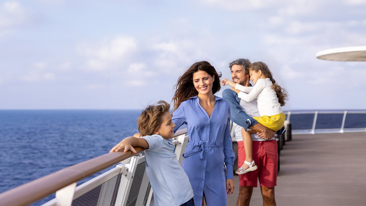 Happy family on cruise ship deck with sea view | MSC Cruises