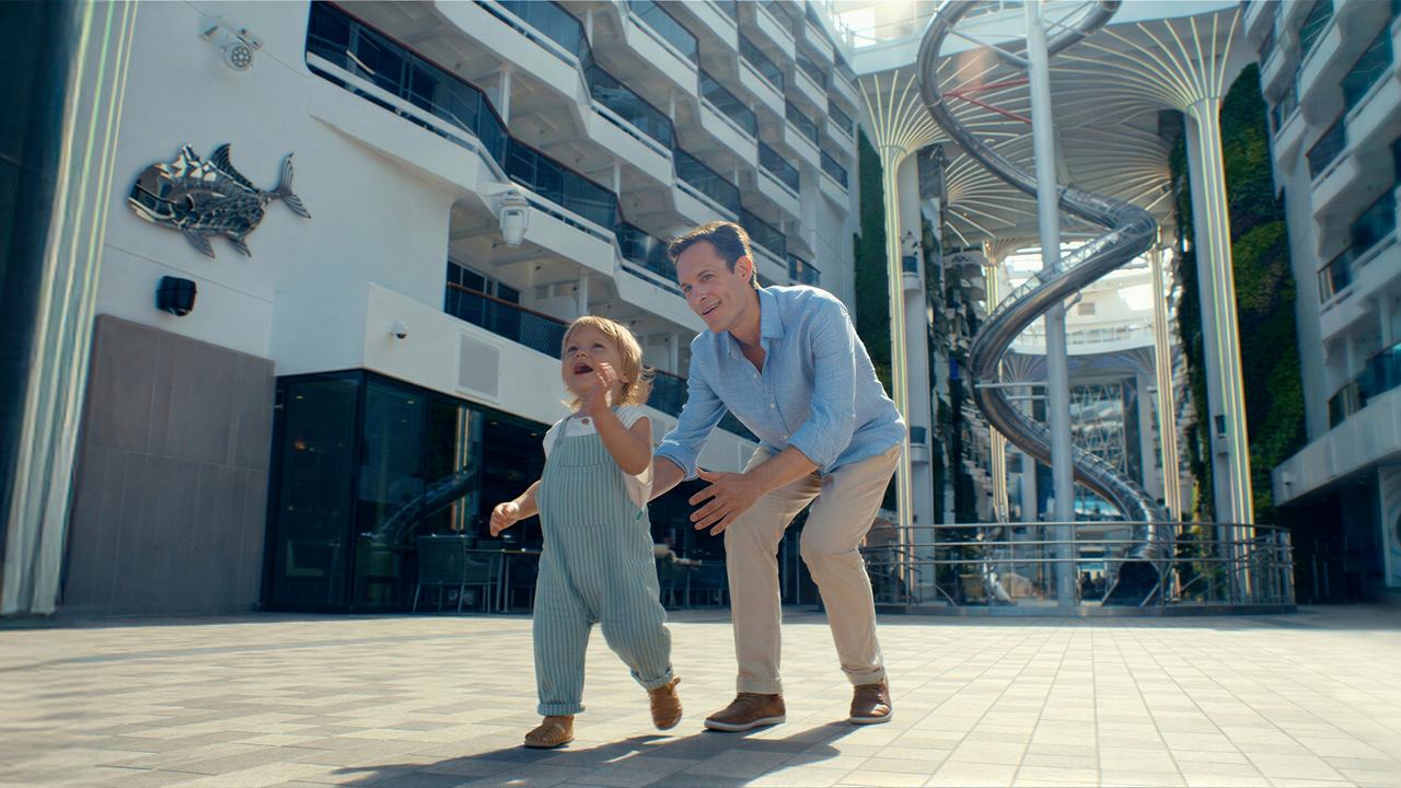 Father and child enjoy time together in a modern urban setting | MSC Cruises