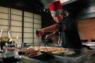 Chef prepares dishes with focus and skill | MSC Cruises