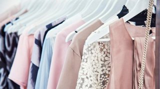 A variety of stylish clothing hanging on hangers, ready to inspire your wardrobe | MSC Cruises