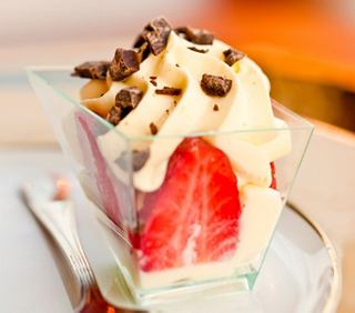 A delightful dessert featuring layers of cream, strawberries, and chocolate | MSC Cruises