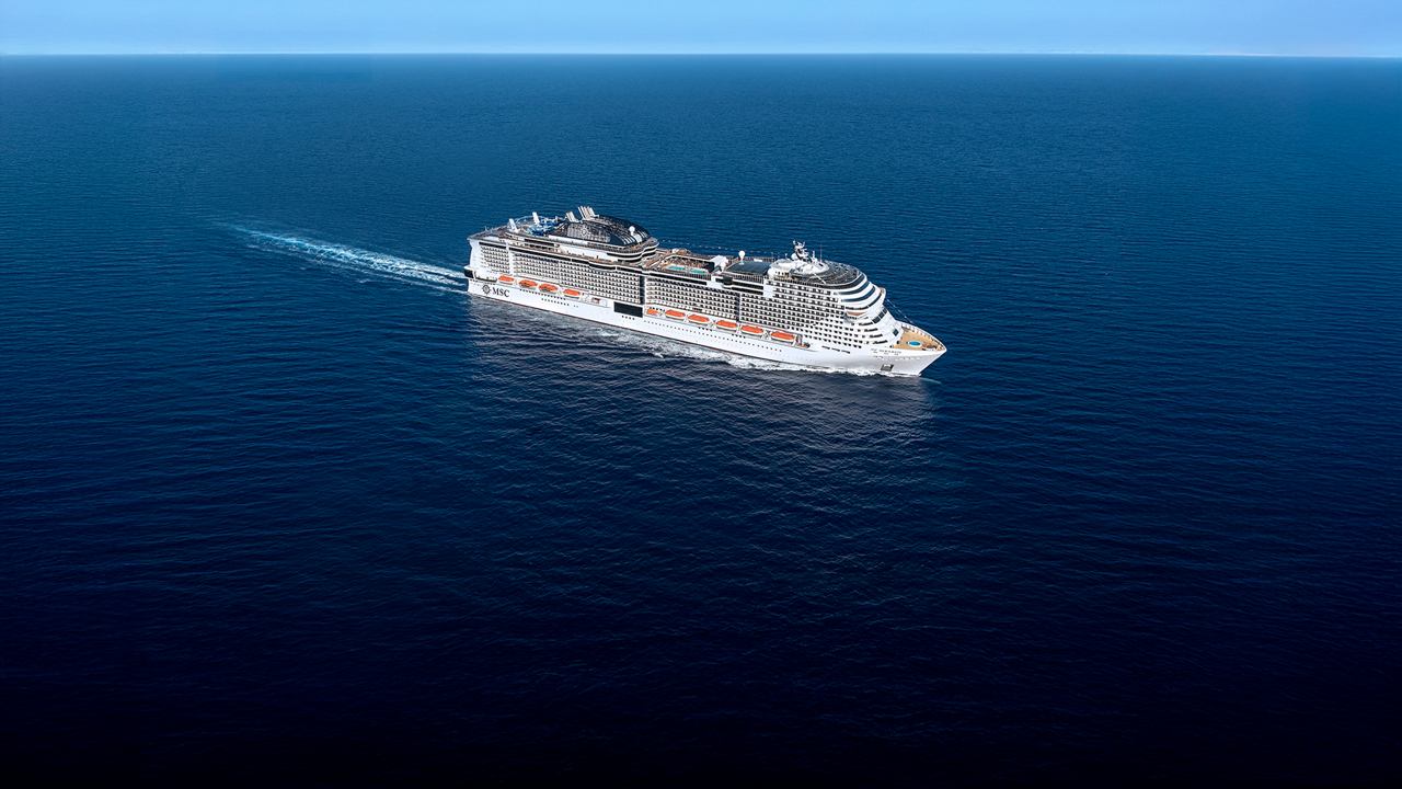The ship glides smoothly across the deep blue ocean | MSC Cruises