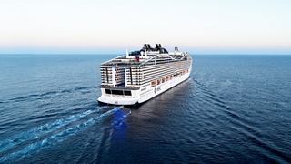 The MSC World Europa gracefully sails through tranquil blue waters under a clear sky | MSC Cruises