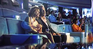 Passengers sit comfortably and enjoy the atmosphere aboard a cruise ship | MSC Cruises