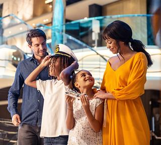 A family enjoys spending time together, smiling and sharing joyful moments | MSC Cruises
