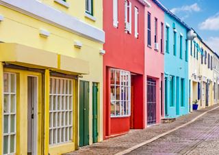 Street lined with buildings painted in vibrant colours | MSC Cruises