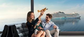 A joyful couple enjoying quality time together with a stunning ocean view in the background | MSC Cruises