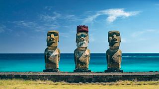 Three iconic Moai statues stand proudly against the backdrop of the sea at Anakena Beach, Rapa Nui, Chile | MSC Cruises