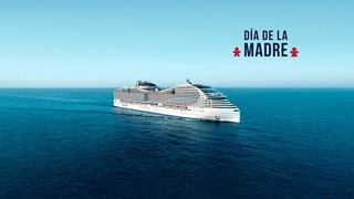 Barco de crucero MSC en mar azul con pequeñas embarcaciones a lo lejos | MSC Cruises