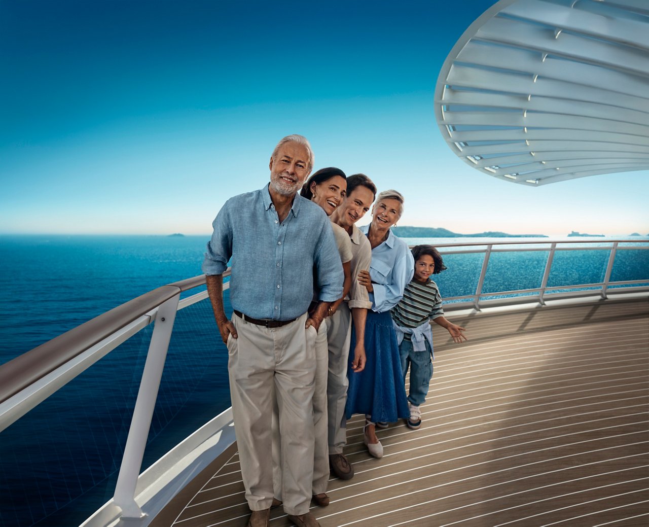 Family on MSC World Europa deck overlooking sea and sky | MSC Cruises