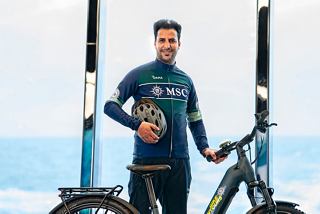 Happy bike tour leader smiling aboard MSC Euribia ship | MSC Cruises