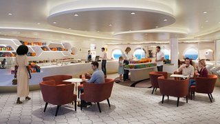 Gli ospiti godono di un lounge accogliente con esposizione di cioccolato e comode sedute | MSC Cruises