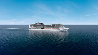 Un majestuoso barco de crucero navega por aguas tranquilas bajo un cielo azul claro | MSC Cruceros