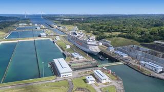 Panoramic view of the Panama Canal featuring navigation channels and green areas | MSC Cruises