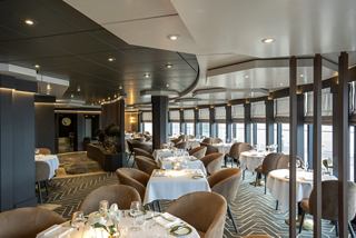 Modern restaurant with elegant décor and panoramic views | MSC Cruises