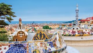 Panoramic view of beautiful Barcelona showcasing the sea and vibrant buildings | MSC Cruises