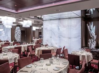 An elegant restaurant with cozy tables and a warm atmosphere for special occasions | MSC Cruises