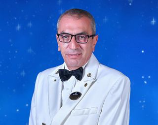 Captain Giuseppe Galano in uniform aboard the ship | MSC Cruises
