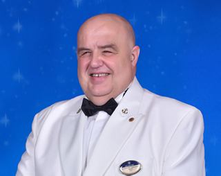 Captain Giuseppe Gazzano in formal uniform portrait | MSC Cruises