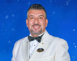 Captain Raffaele Iaccarino in formal attire on the deck | MSC Cruises