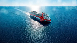 A ship sails over the calm sea, reflecting the bright sunlight | MSC Cruises