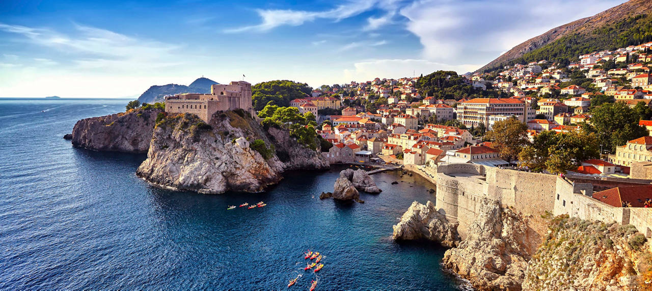 Couple relaxing on a sunbed by the pool | MSC Cruises