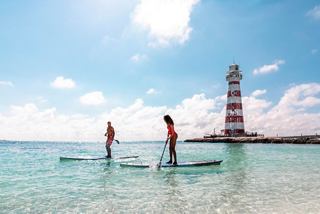 couple paddle boarding in OC