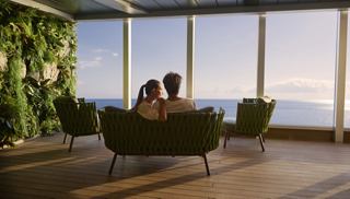 A couple relaxes on a couch in a cruise | MSC Cruises