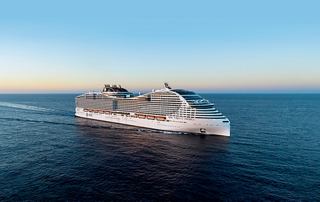 The MSC cruise ship glides gracefully across the open sea | MSC Cruises
