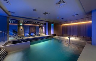 Área de spa contemporánea con un ambiente relajante y una iluminación acogedora | MSC Cruceros