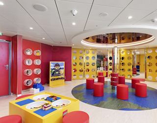 A vibrant children's club space featuring colourful furniture and engaging areas for play and activities | MSC Cruises