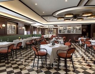 A warm and inviting dining area featuring elegant tables and comfortable seating in a stylish restaurant | MSC Cruises