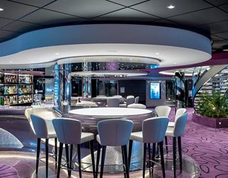 Modern bar area with comfortable seating and a stylish atmosphere | MSC Cruises