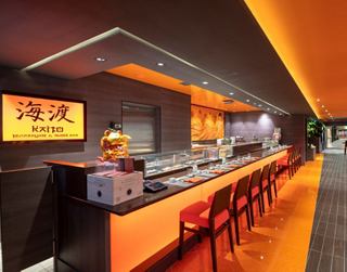 The modern sushi bar offers a unique experience with vibrant colors and stylish decor | MSC Cruises