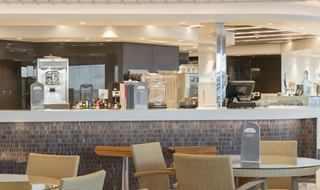 Bright bar with seating, providing a cozy atmosphere for relaxation | MSC Cruises
