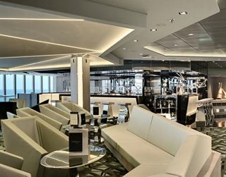 A stylish restaurant and bar area featuring comfortable seating and a modern design | MSC Cruises