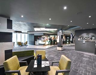 A stylish restaurant and bar area featuring modern furnishings and inviting seating arrangements | MSC Cruises