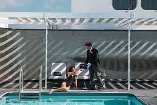 Poolside drink service at the MSC Yacht Club Sundeck Bar | MSC Cruises
