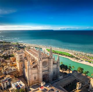 Majestic cathedral by a scenic coastline and vibrant blue sea | MSC Cruises