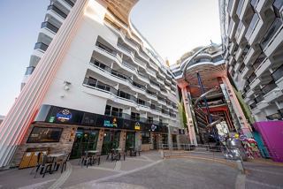 All-Stars Sports Bar and entertainment area with balconies and vibrant features on MSC World America | MSC Cruises
