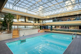 Bamboo Pool with sliding roof and bar on MSC Euribia creates a welcoming onboard space | MSC Cruises