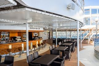Barracuda Bar on MSC Orchestra features an inviting outdoor seating area with sea views | MSC Cruises
