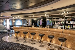 Elegant bar with stylish stools and spacious counter for relaxation on the cruise ship | MSC Cruises