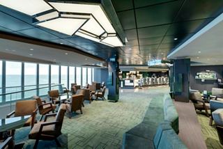 Edge Cocktail Bar on MSC Grandiosa features a comfortable sitting area and large windows overlooking the sea | MSC Cruises
