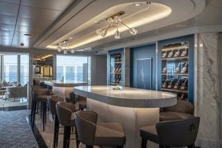 Fizz Champagne Bar on MSC World Europa features inviting seating and contemporary ambiance | MSC Cruises