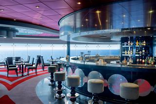 Galaxy Lounge bar featuring modern decor and panoramic sea views | MSC Cruises